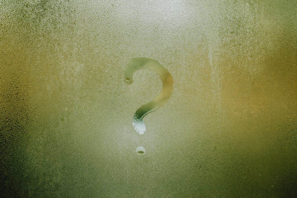 Misted Window with Question Mark