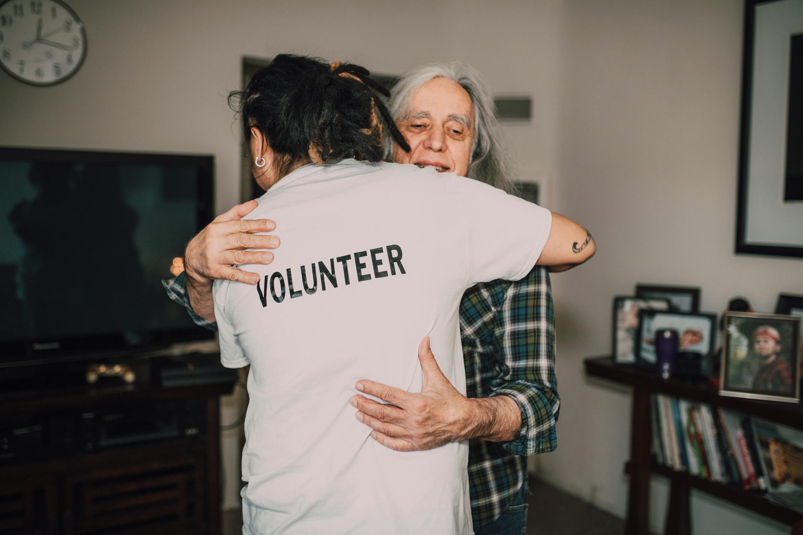 Two People Hugging Each Other